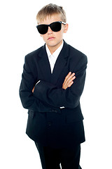 Image showing Snapshot of young kid wearing suit and sunglasses