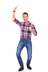 Image showing happy casual man celebrating his success