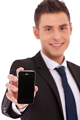 Image showing buiness man shows a smartphone