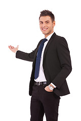 Image showing Happy business man presenting