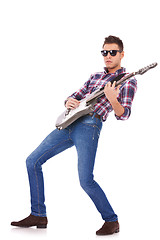 Image showing Guitar player playing rock and roll 