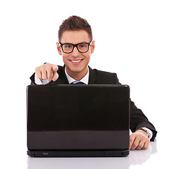 Image showing entrepreneur at his desk working on laptop