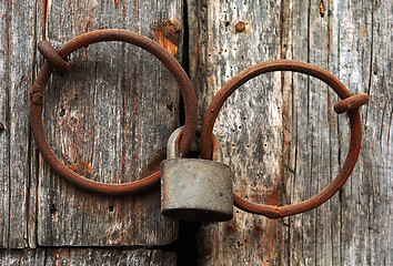 Image showing Closed gate with a lock