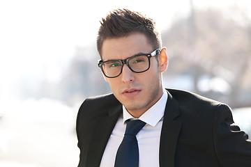 Image showing executive wearing glasses