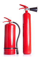 Image showing two  fire extinguishers on white