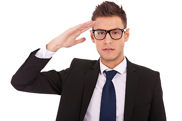 Image showing Business man wearing glasses gives salute