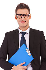 Image showing Business man with a clipboard 