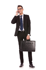 Image showing business man talking on a  mobile phone