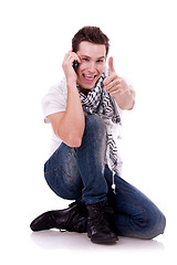 Image showing talking on the phone and  making the ok