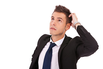 Image showing young thoughtful businessman