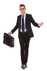 Image showing young business man walking and welcoming