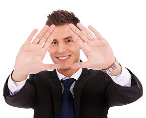 Image showing business man making a hand frame