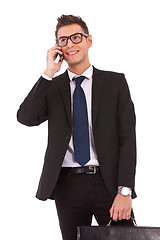 Image showing business man speaking on the phone