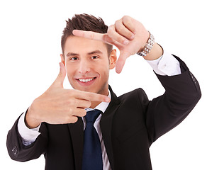 Image showing executive making frame with his hands 