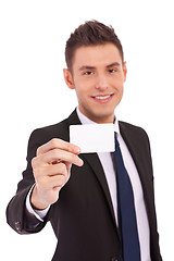 Image showing business man show card