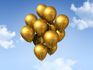 Image showing gold balloons on a blue sky