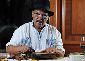 Image showing man making luxury handmade cuban cigare