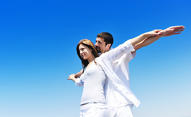 Image showing happy young couple have fun on beach