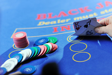 Image showing woman play black jack card game in casino