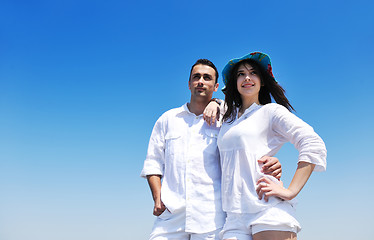 Image showing happy young couple have fun on beach