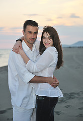 Image showing happy young couple have fun on beach