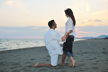 Image showing happy young couple have fun on beach