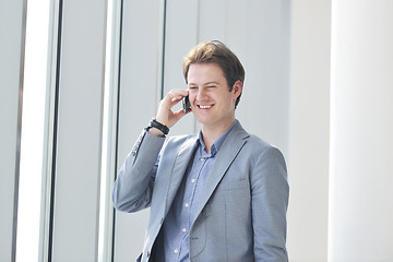 Image showing young business man talk by cellphone