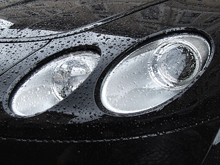 Image showing Black new sporty car headlights