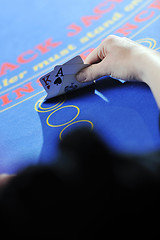 Image showing woman play black jack card game in casino