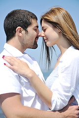 Image showing happy young couple have fun on beach