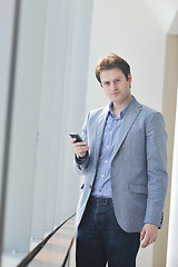 Image showing young business man talk by cellphone