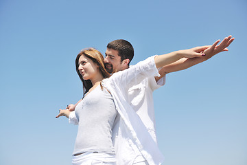 Image showing happy young couple have fun on beach