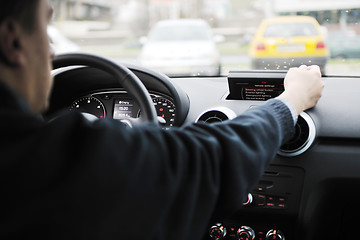 Image showing man using car navigation