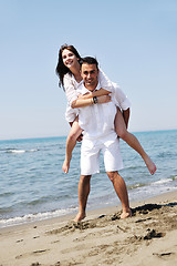 Image showing happy young couple have fun on beach