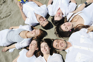 Image showing Group of happy young people in have fun at beach