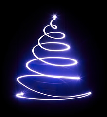 Image showing Christmas tree with light and blue star.