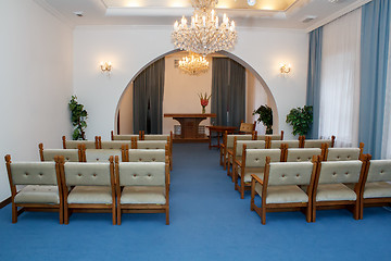 Image showing small ruralwedding ceremony room with chandelier