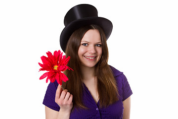 Image showing Young woman with red flower