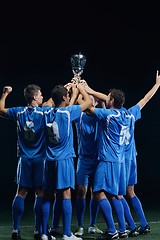 Image showing soccer players celebrating victory