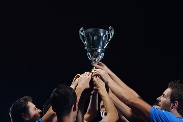 Image showing soccer players celebrating victory