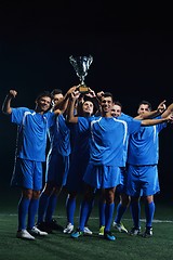 Image showing soccer players celebrating victory