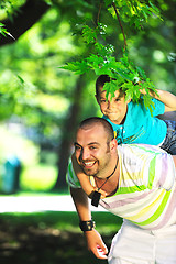 Image showing happy father and son have fun at park