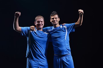 Image showing soccer players celebrating victory