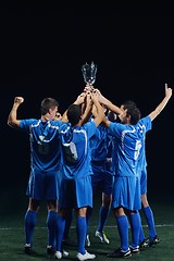 Image showing soccer players celebrating victory