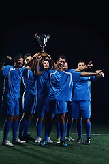 Image showing soccer players celebrating victory