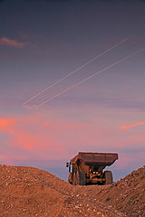 Image showing Picture of a large truck and light lines from airplane