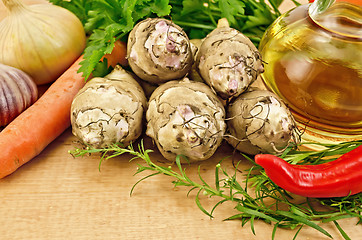 Image showing Jerusalem artichokes with vegetables on the board