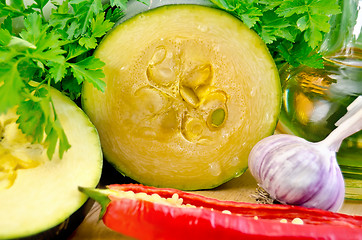 Image showing Zucchini with vegetables and oil