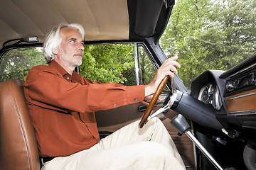 Image showing man in his car