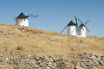 Image showing White ancient windmills